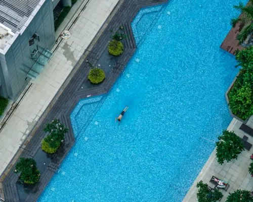 Elegant living room with blue ottoman